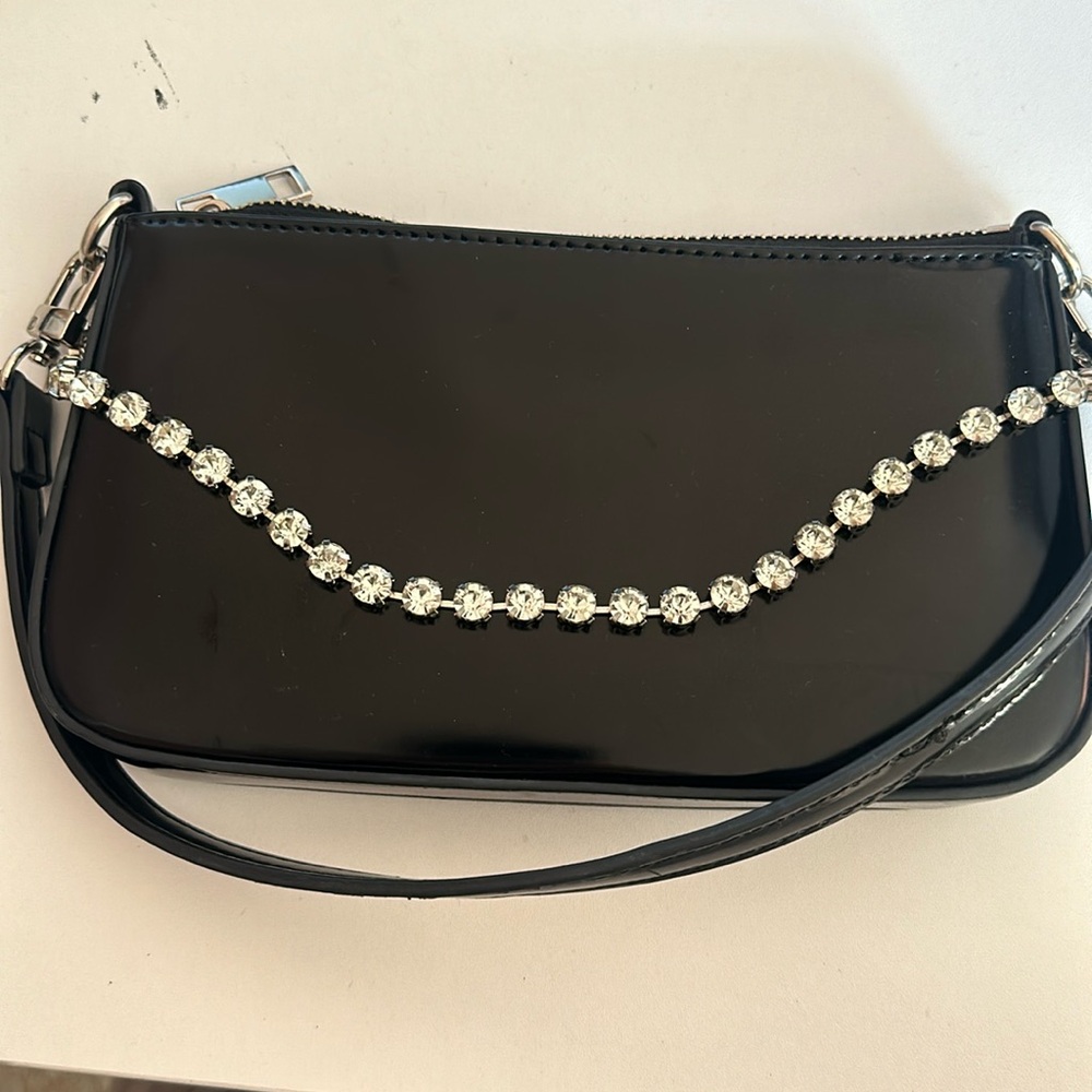 Trendy going out patent leather bag with rhinestone cross detail